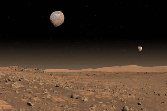Phobos and Deimos, the two small moons of Mars, above a stony Martian horizon