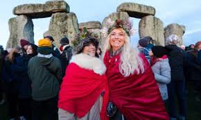 Modern day gathering of Druid Followers Celebrating Solstice at Stonehendge